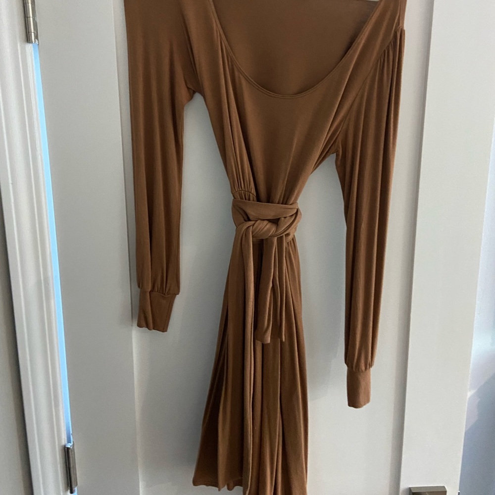 Long sleeve dress with built in belt a little above the knee length